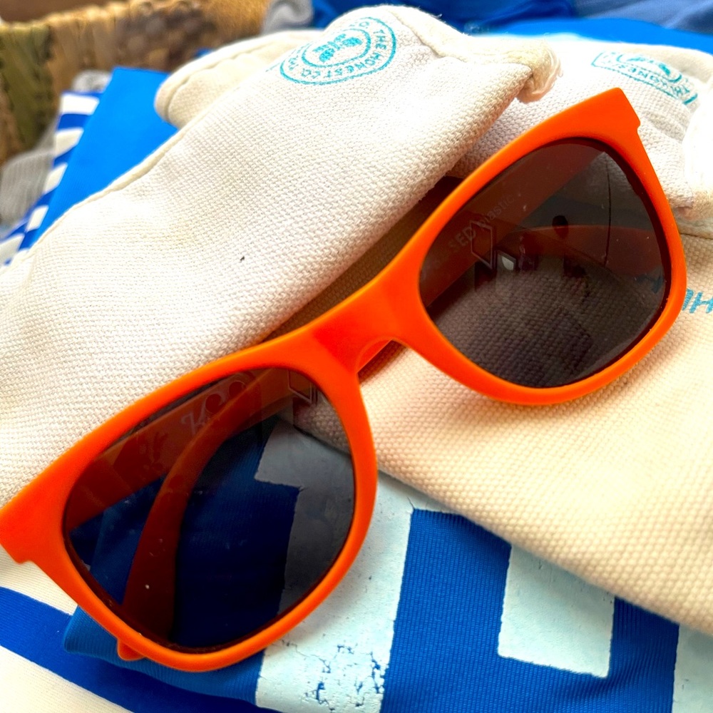 The Honest Company kids orange sunglasses with eyeglass case (two cases).